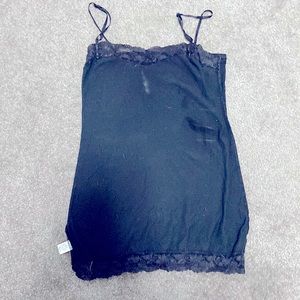 Black tank top with lace on the bottom and top.